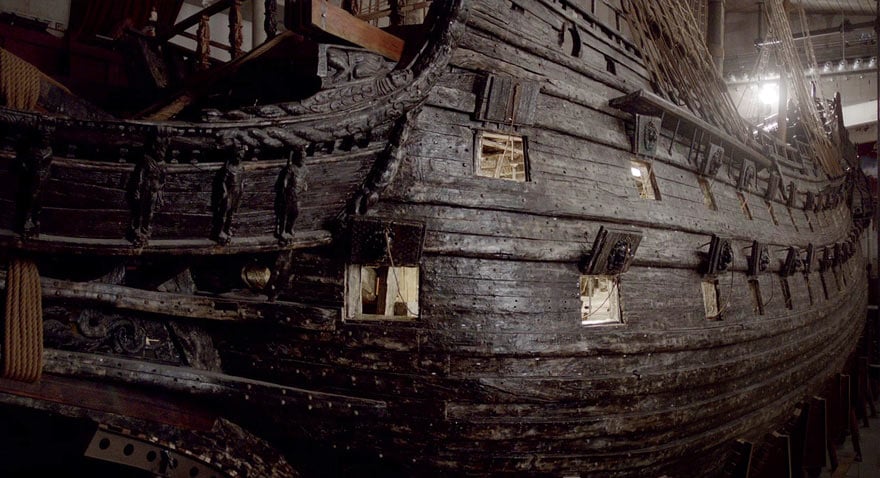 a wooden ship with persony windows