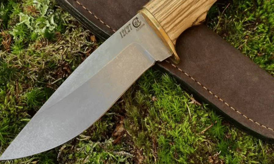 a knife with a wooden handle