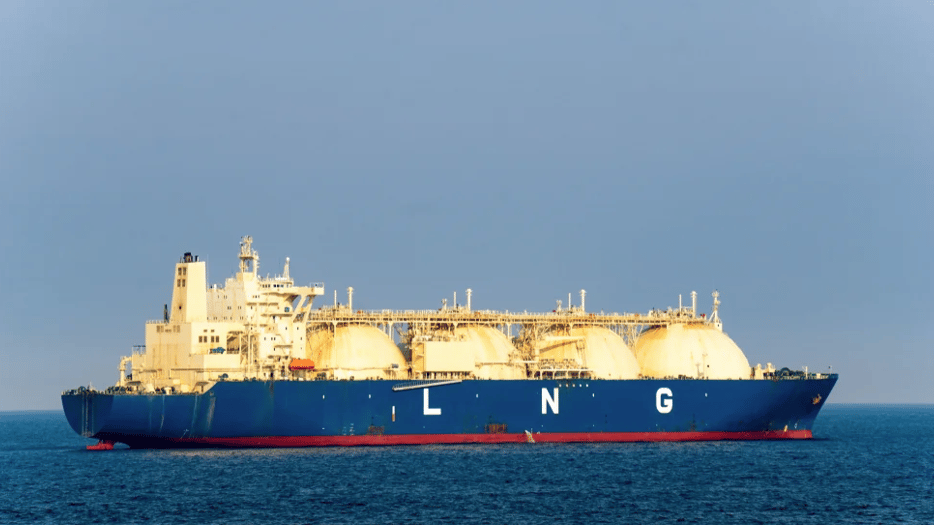 a large blue ship with white letters on it