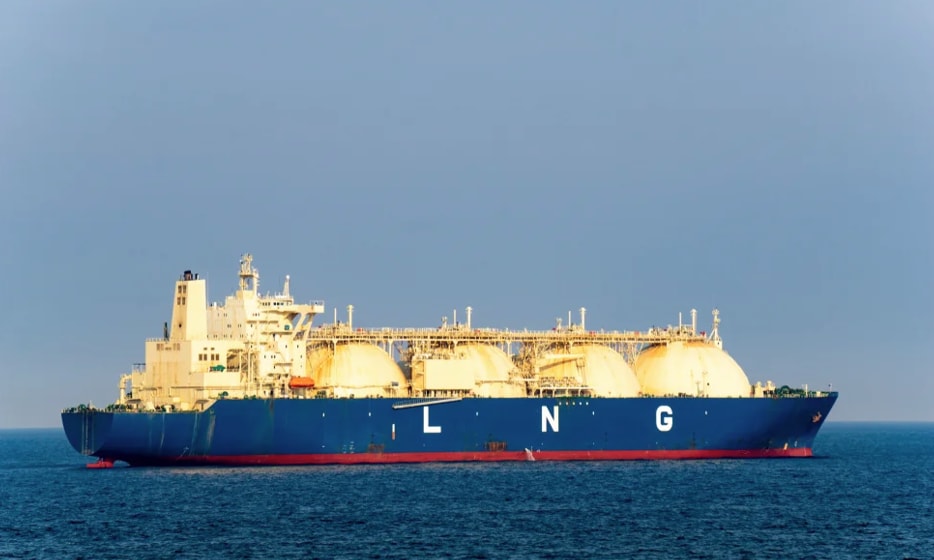 a large blue ship with white letters on it